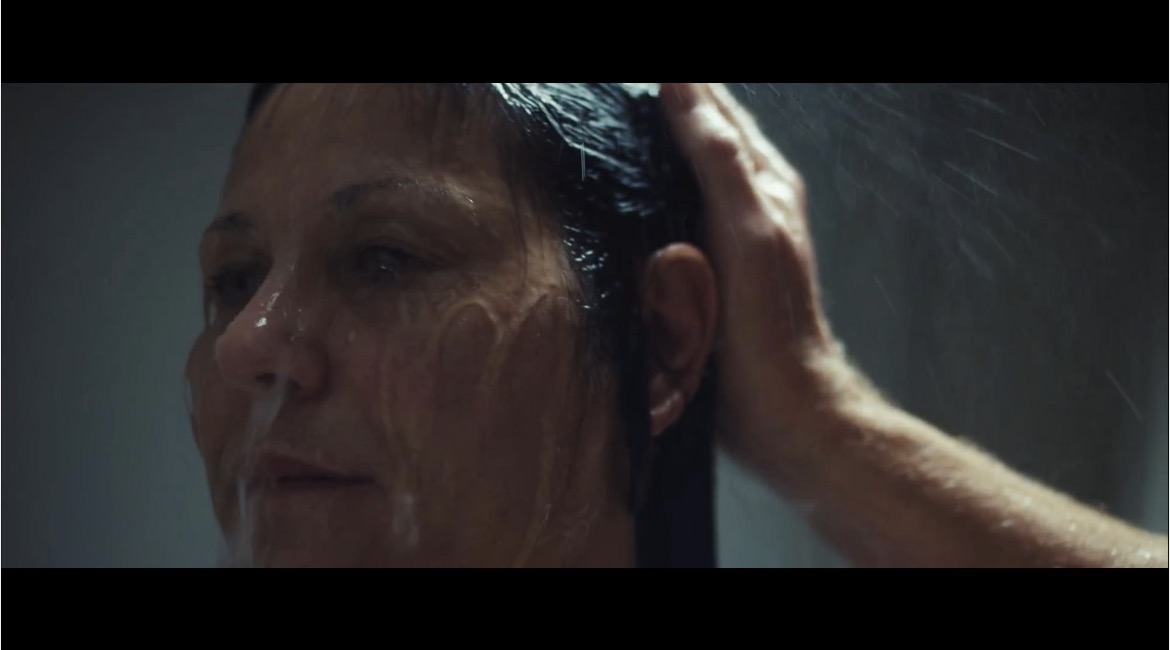 Close-up of Marie Finch in an emotionally intense dramatic scene